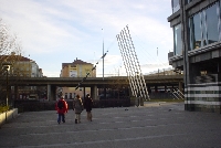 Stone statues diving into the river.