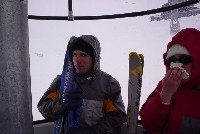 Nico and Rachael blowing her nose in the lift