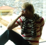 Strenously denies using hair 
straighteners